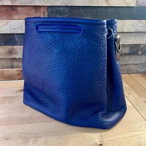 Go Forth Goods Violet Abby, like new. Has Mocha accents and crossbody strap